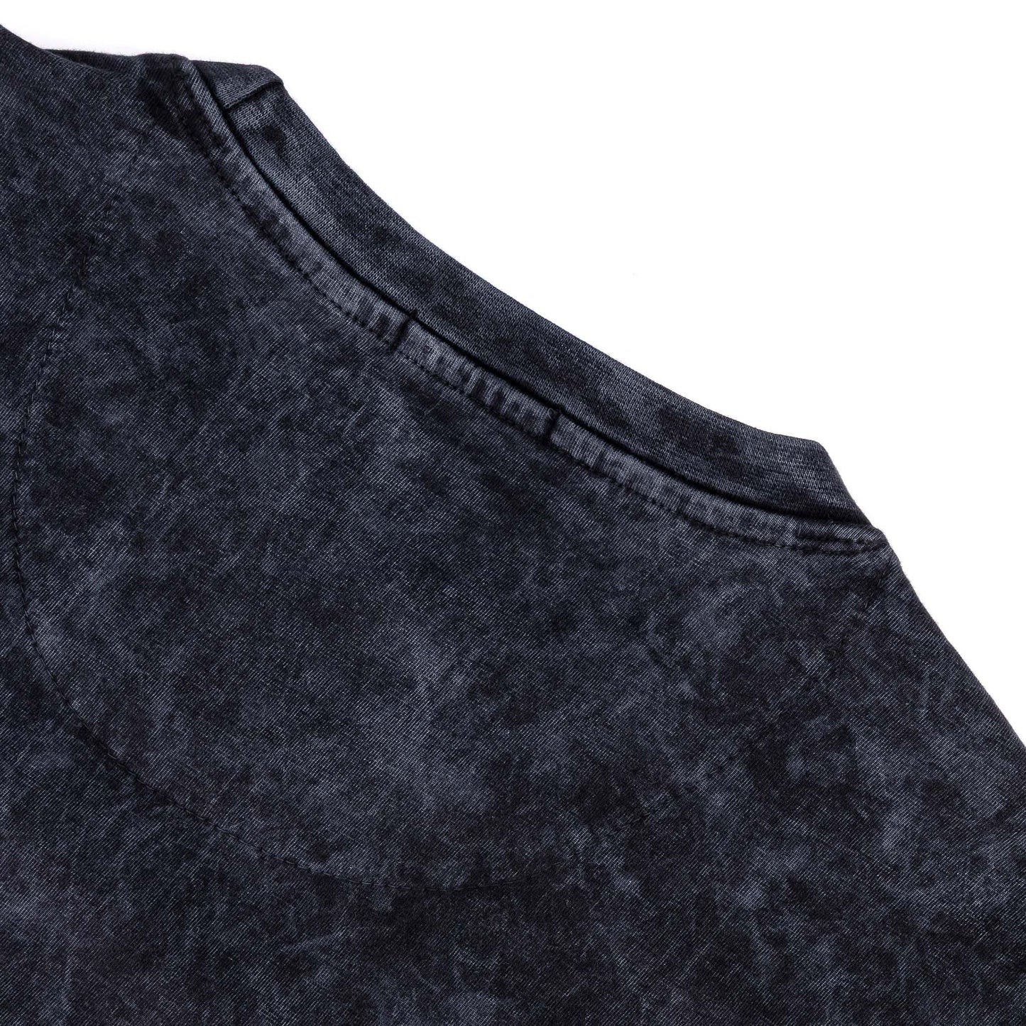 Close-up of the neckline and fabric texture of the Rodgers Tee - Black, showcasing its unique garment-washed design.