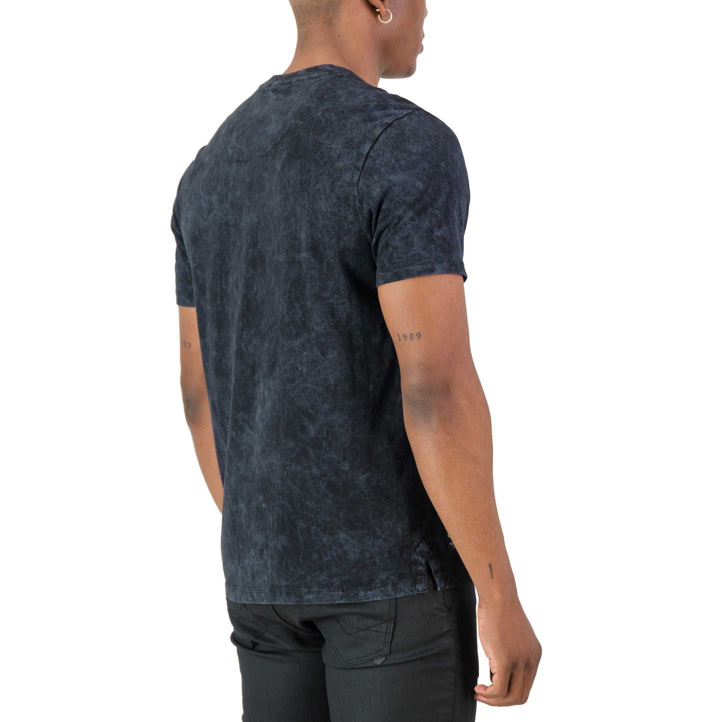 Men's back view of the Rodgers Tee - Black showcasing utility-inspired design and bold panel line details.