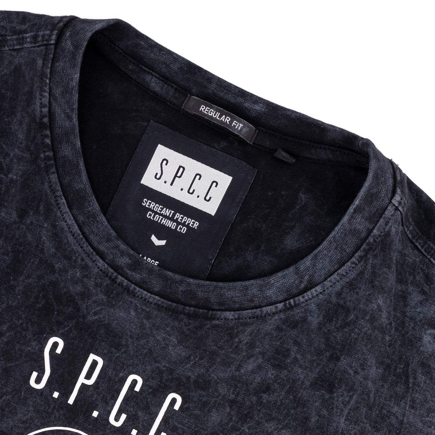 Rodgers Tee - Black close-up showing the neckline and garment label.