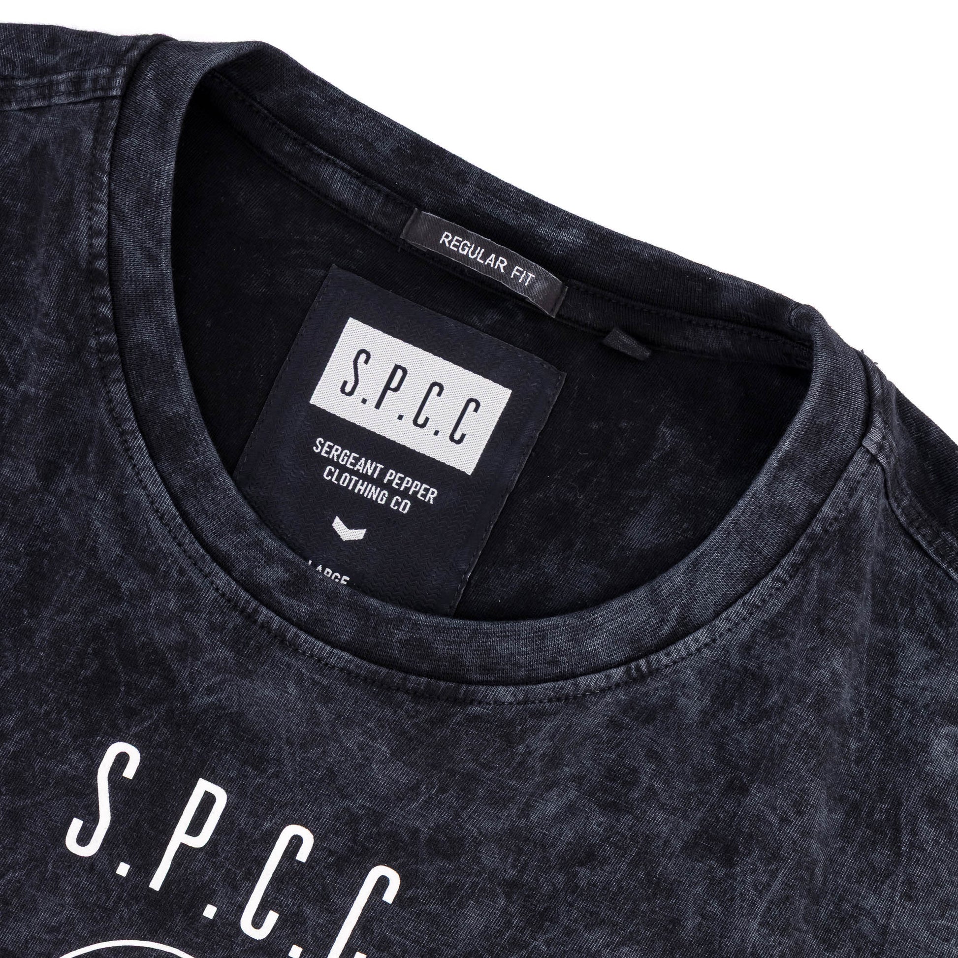 Rodgers Tee - Black close-up showing the neckline and garment label.