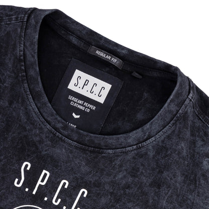 Rodgers Tee - Black close-up showing the neckline and garment label.