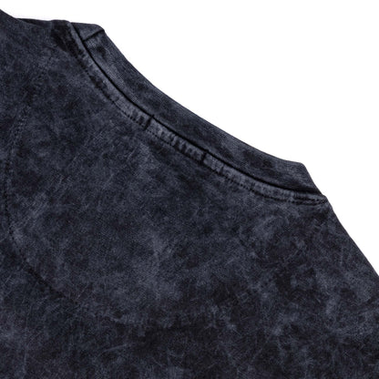 Close-up of the neckline and fabric texture of the Rodgers Tee - Black, showcasing its unique garment-washed design.
