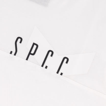SPCC logo detail on the Surge Atlas Tee - White showcasing refined streetwear style and premium quality.