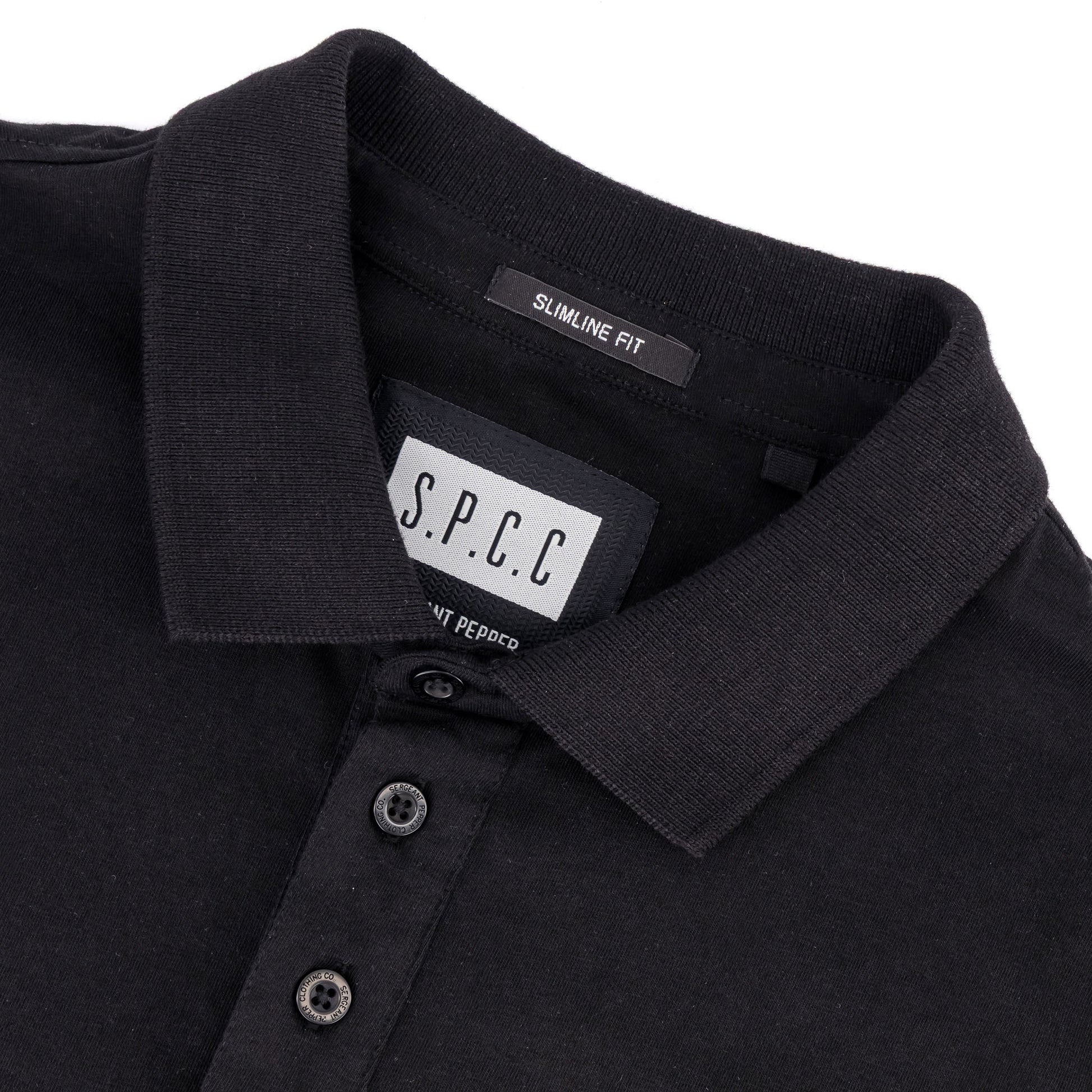 Recon Escalade Golfer - Black close-up of collar and tag, showcasing premium cotton pique jersey and slimline fit design.