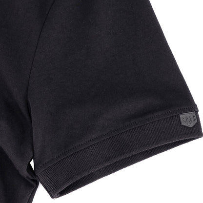 Recon Escalade Golfer - Black close-up of the knitted collar and cuff detailing.