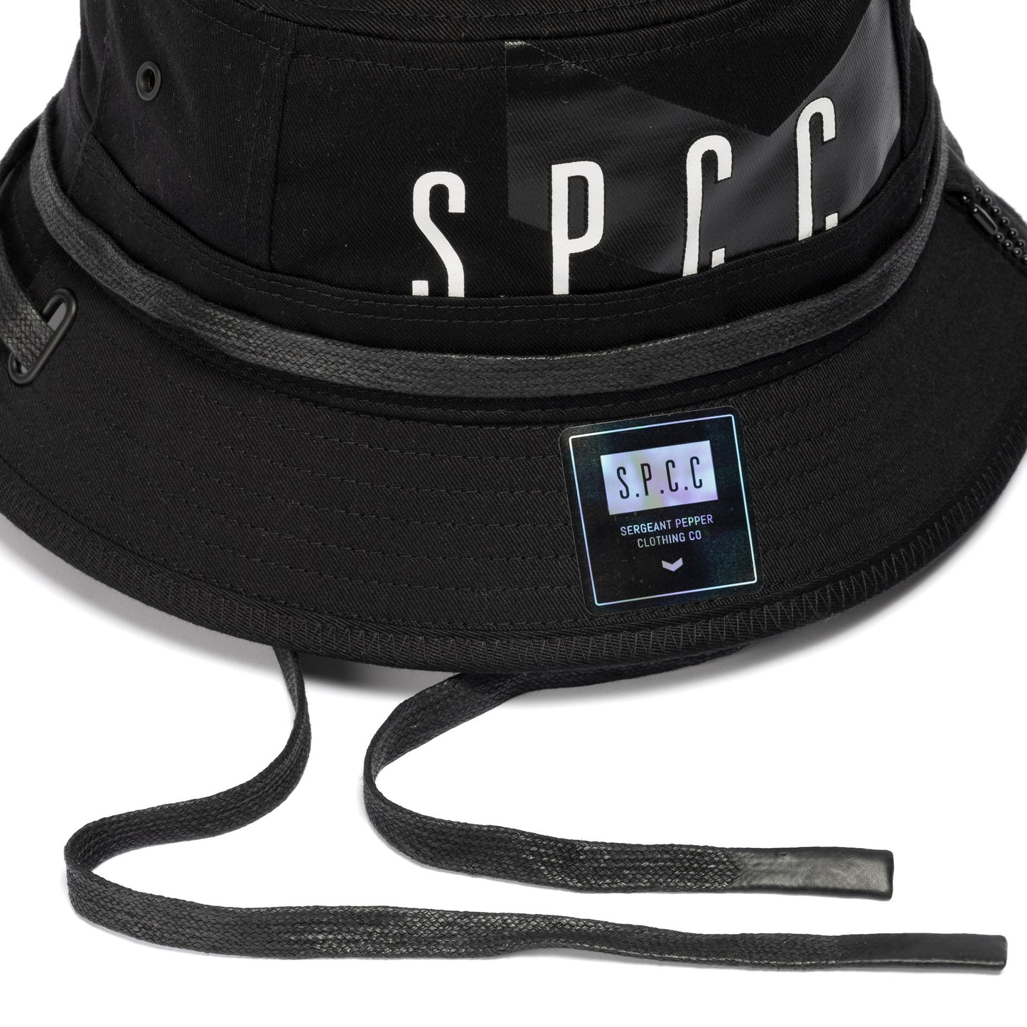 Surge Atlas Bucket Hat - Black featuring SPCC logo, twill tape detail, and rubber badge for urban style.
