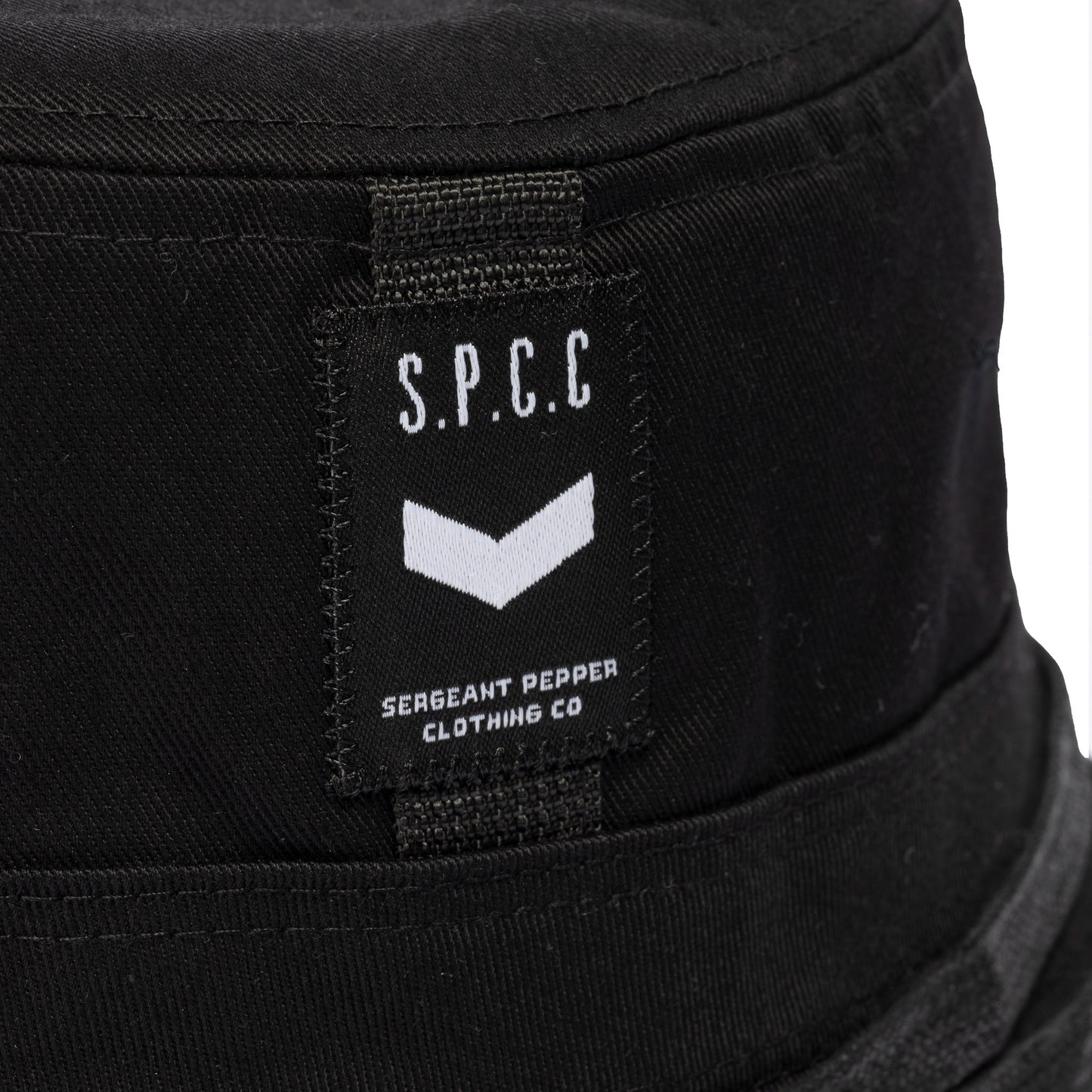 Surge Atlas Bucket Hat - Black showcasing S.P.C.C. label and bold design details for urban fashion.