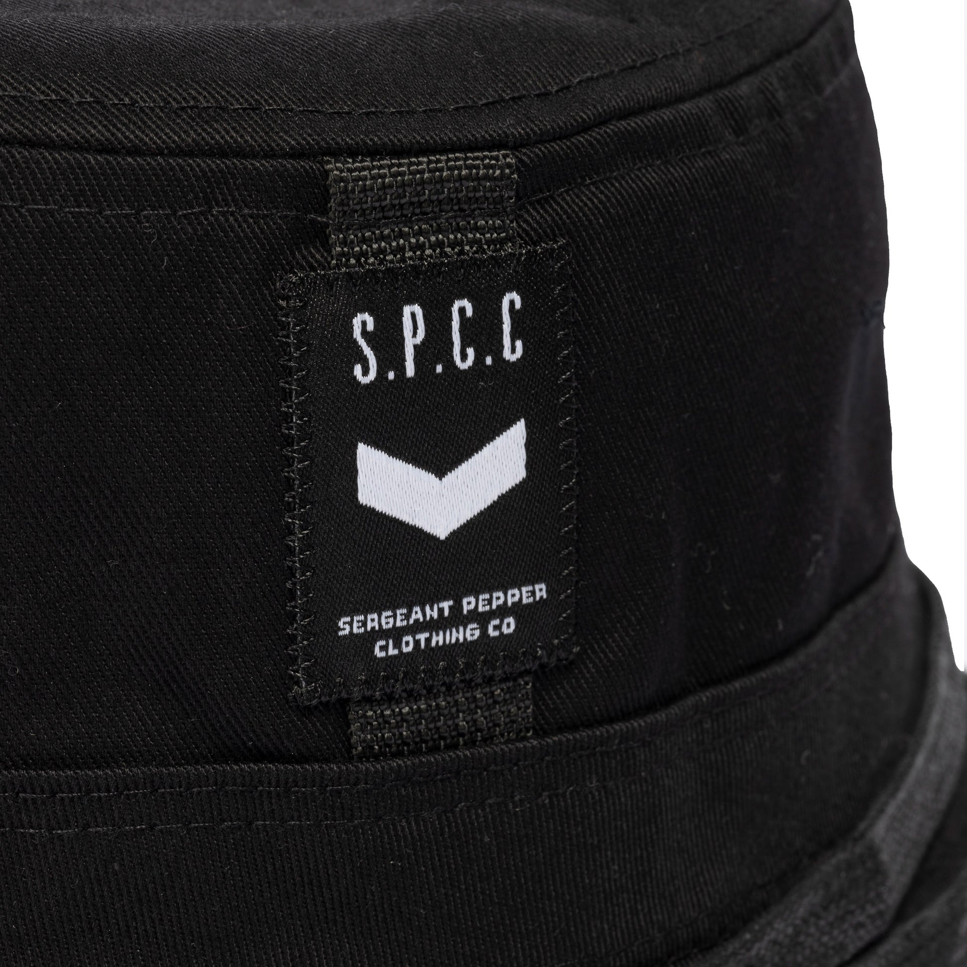 Surge Atlas Bucket Hat - Black showcasing S.P.C.C. label and bold design details for urban fashion.
