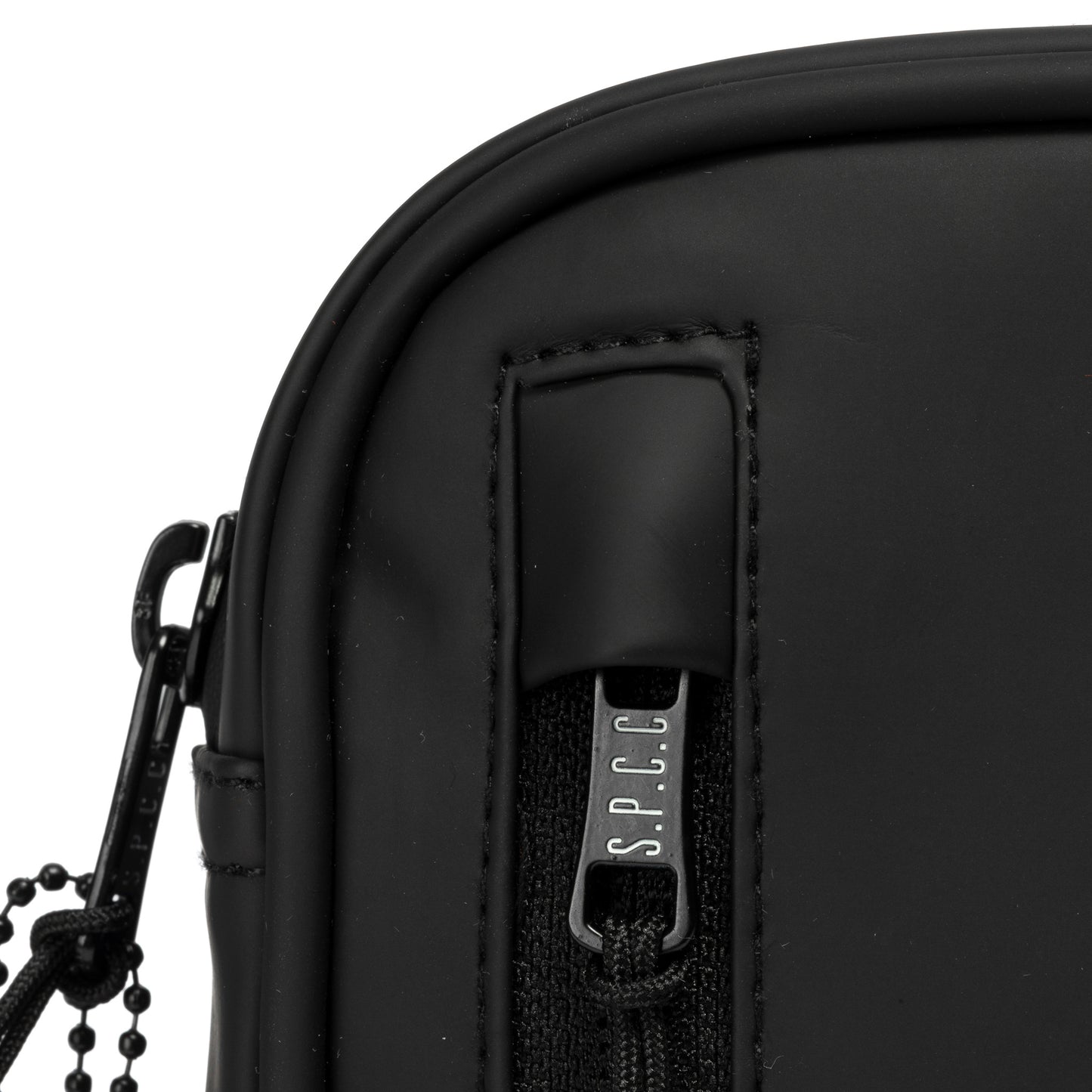 Surge Atlas Hip Bag - Black close-up view of zipper and technical fabric detailing