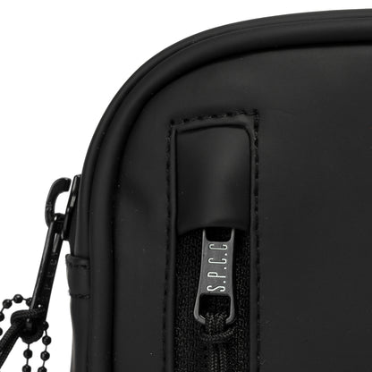 Surge Atlas Hip Bag - Black close-up view of zipper and technical fabric detailing