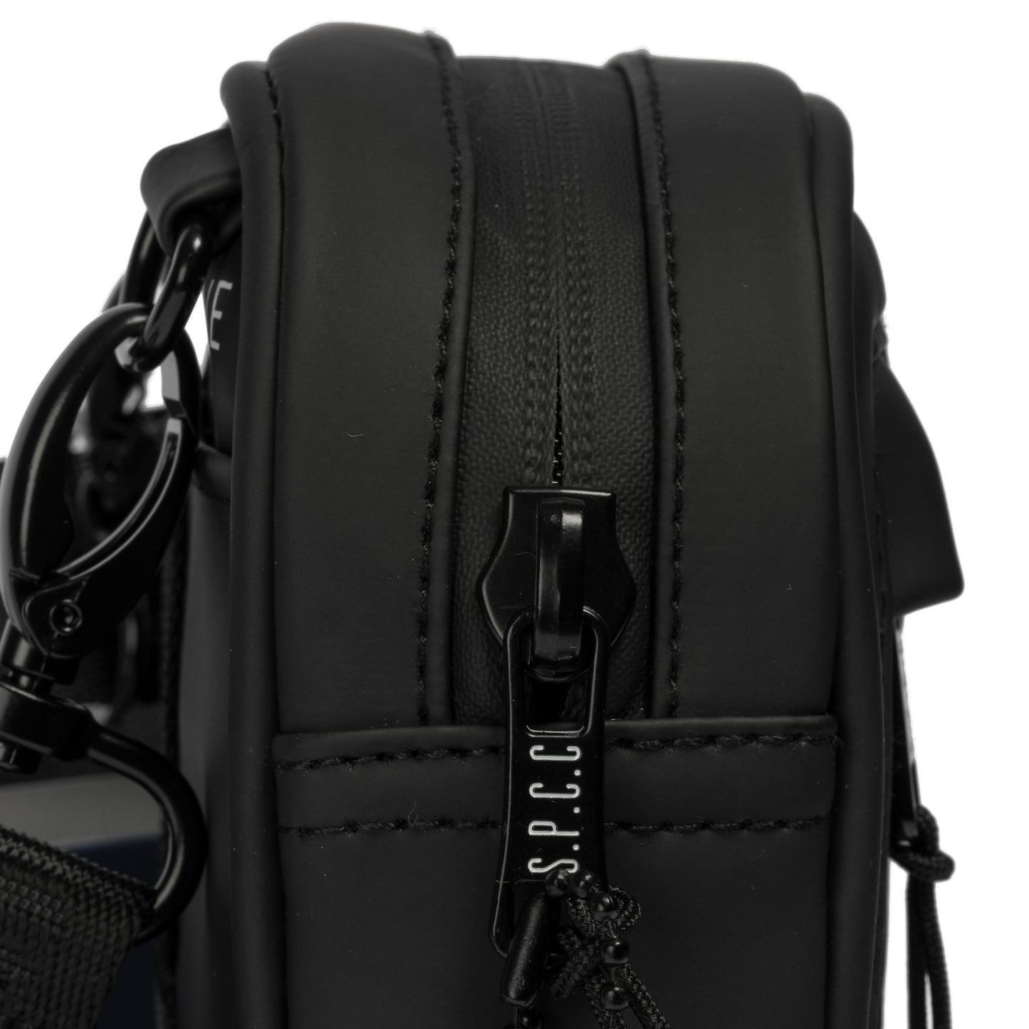 Surge Atlas Hip Bag - Black showcasing the top zip closure and durable black hardware.