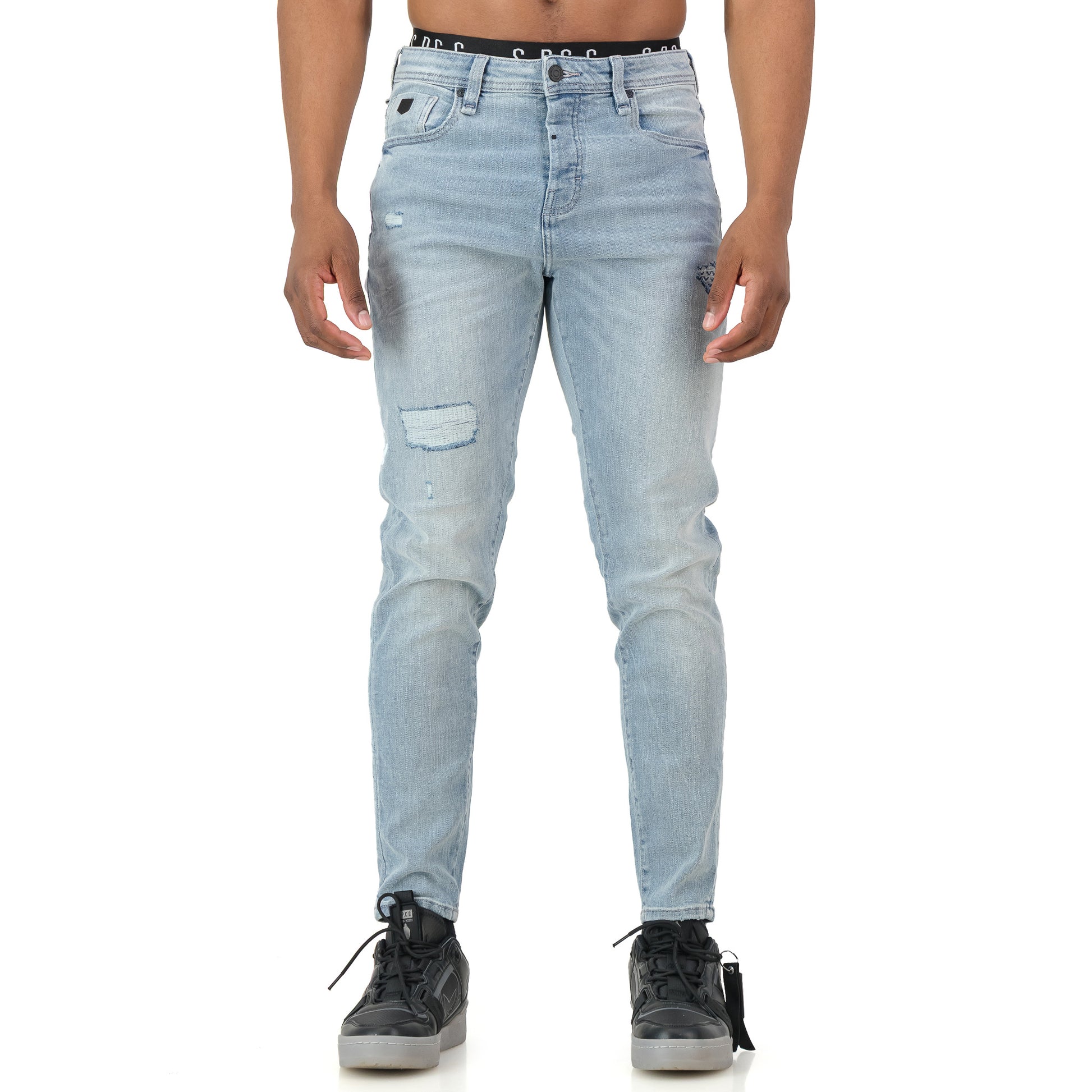 Typhoon Jeans - Bleach showcasing a fitted design with heavy bleach wash and tactical detailing for a stylish street look.