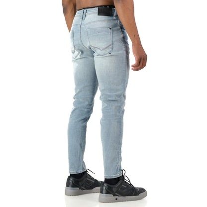 Typhoon Jeans - Bleach showcased from the back, featuring a heavy bleach wash and stylish design details.