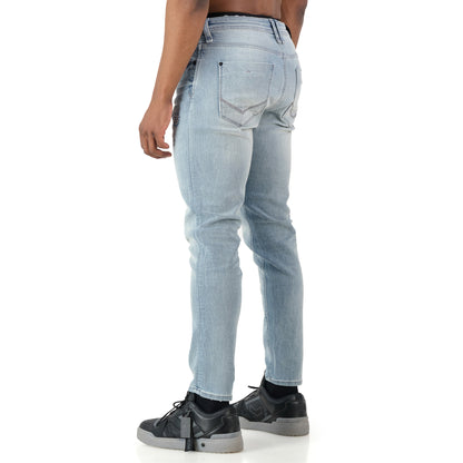 Typhoon Jeans - Bleach showcased from the back, featuring a heavy bleach wash and tactical detailing.