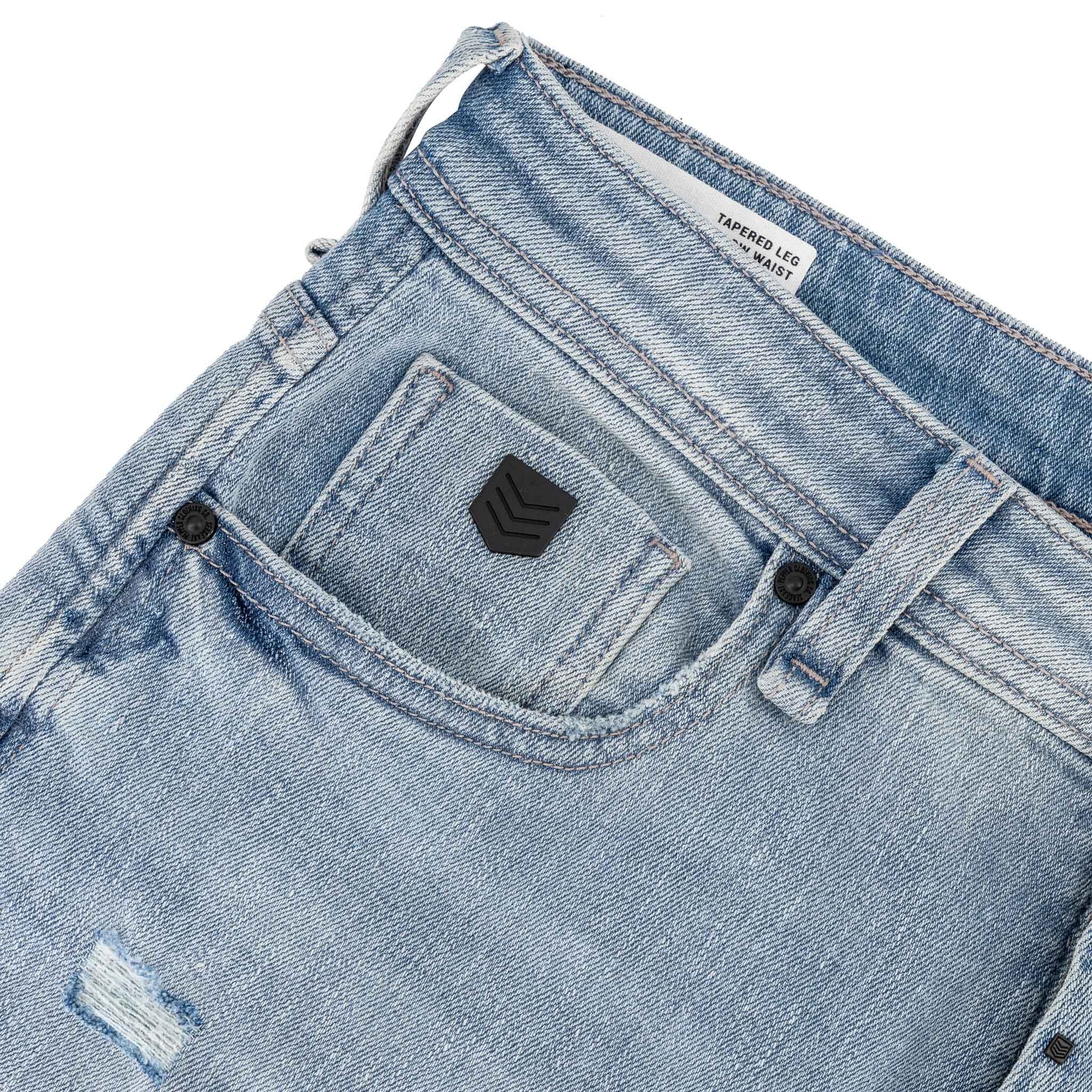 Typhoon Jeans - Bleach showcasing black coin pocket badge and bleached denim texture.