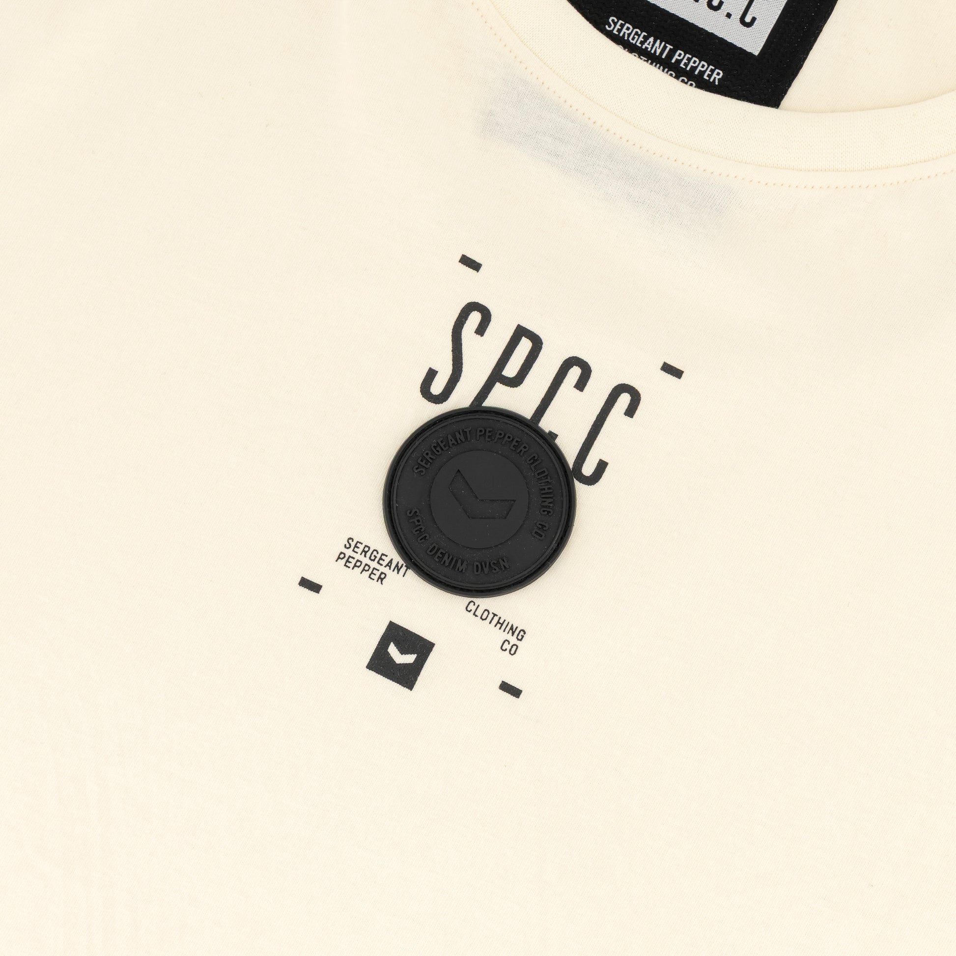 Romain Tee  - Off White featuring SPCC print and badge detail on soft-touch fabric.